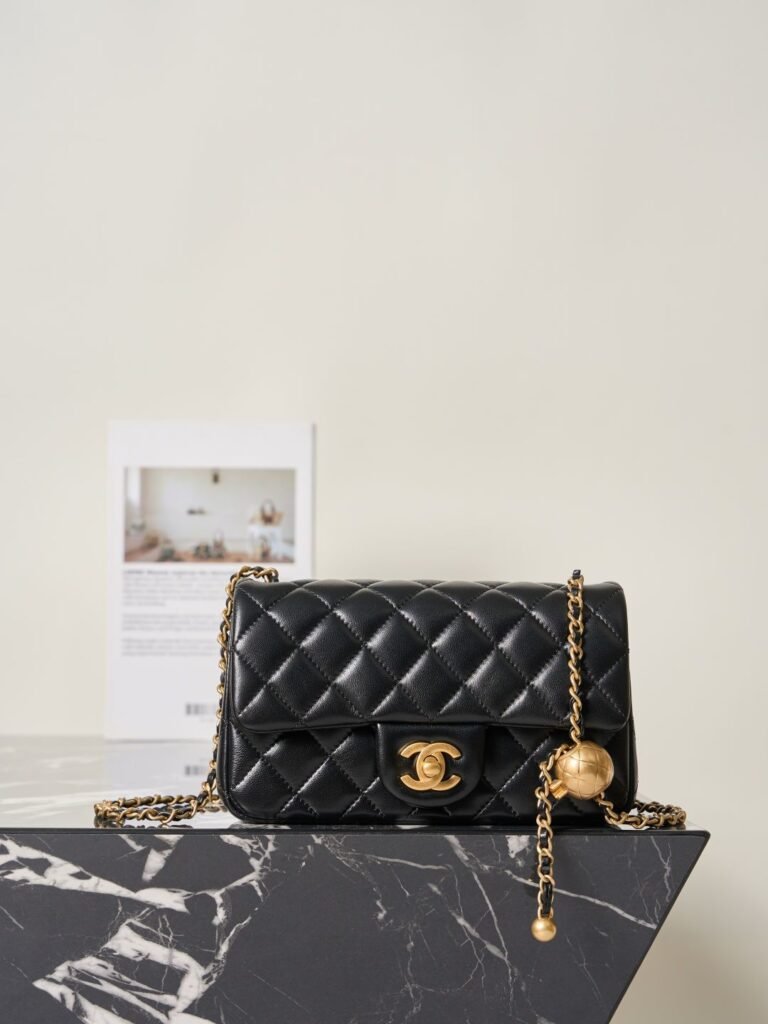 lassic Black Quilted Leather Mini Flap Bag with Adjustable Gold Ball Chain (Chanel Style)