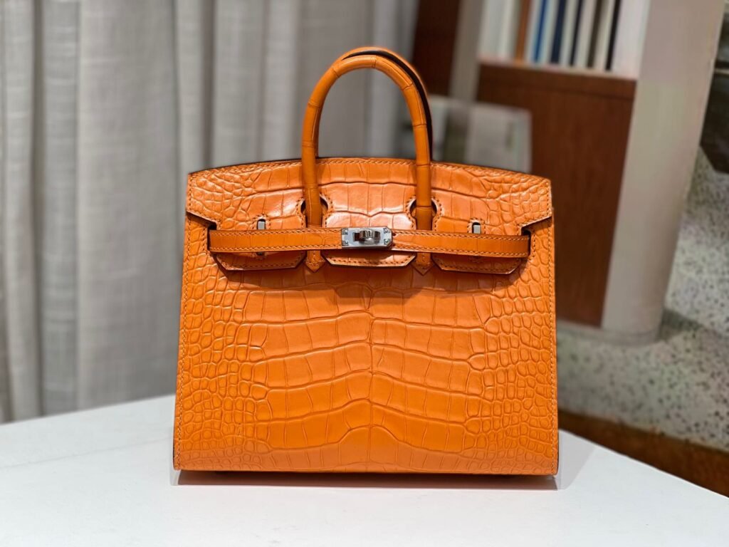 Vibrant Classic Orange Crocodile Patterned Leather Handbag with Silver Hardware