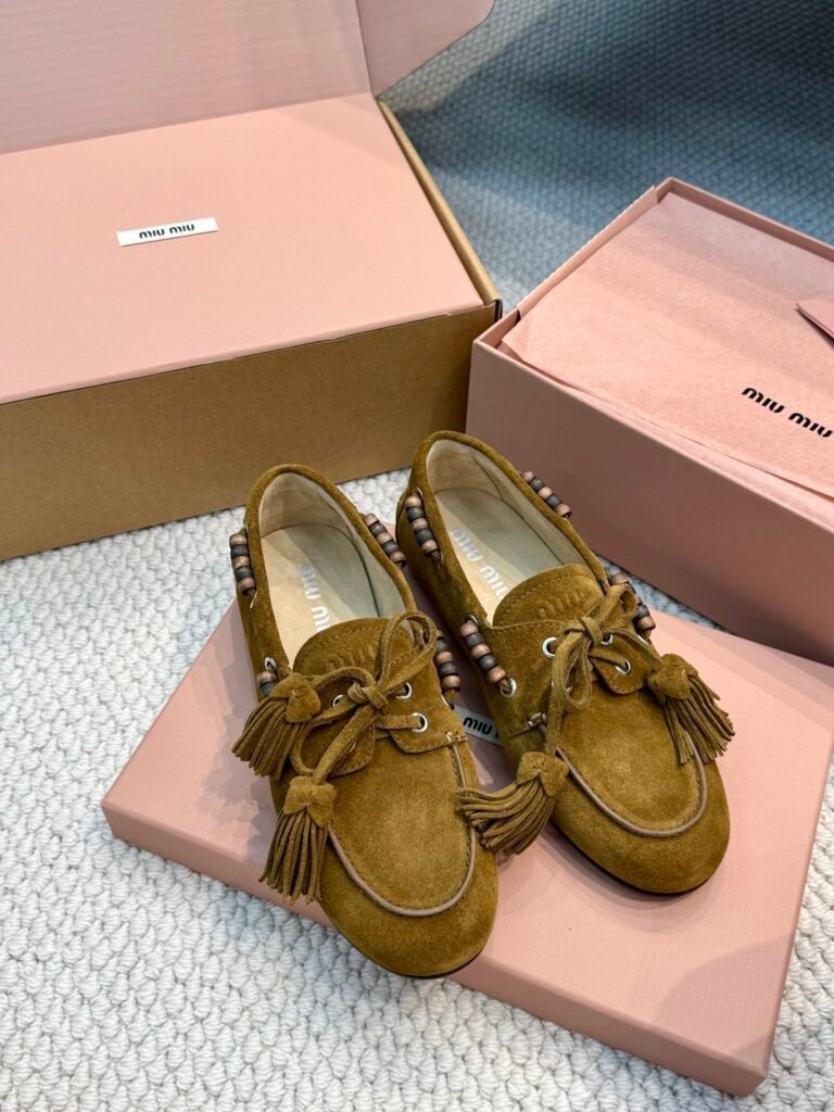 Miu Miu Mustard Suede Tassel Loafers with Wooden Bead Trim